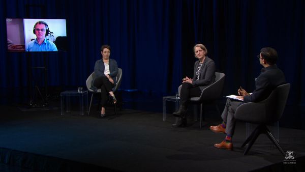 Still frame from Episode 2, showing panelists talking with one another