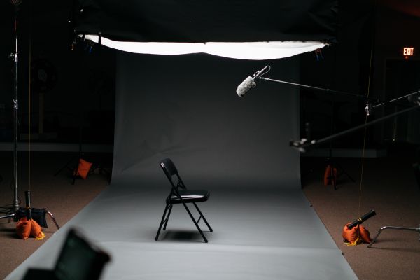 Photo of a studio with chair and microphone