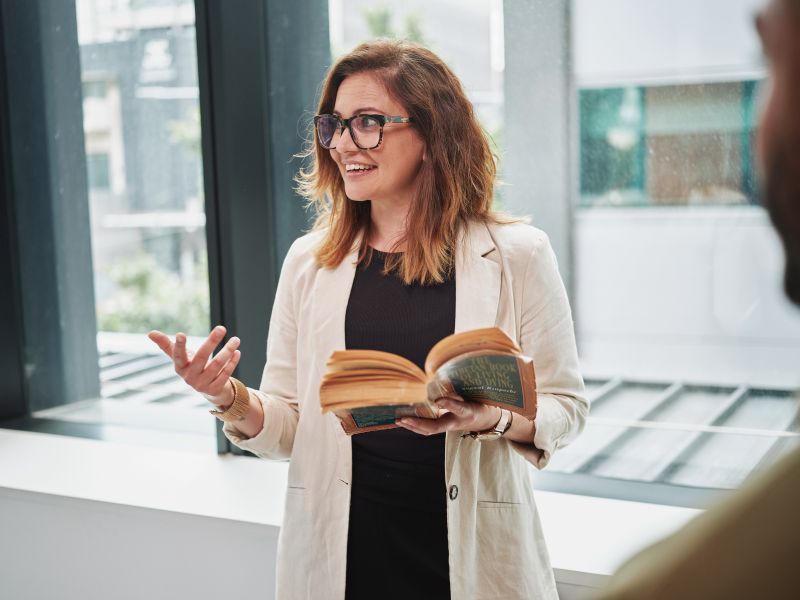 Woman holding book
