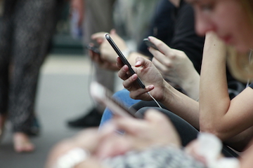 Person looking at mobile phone